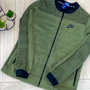 Men’s Nike track zip up  jacket size large green